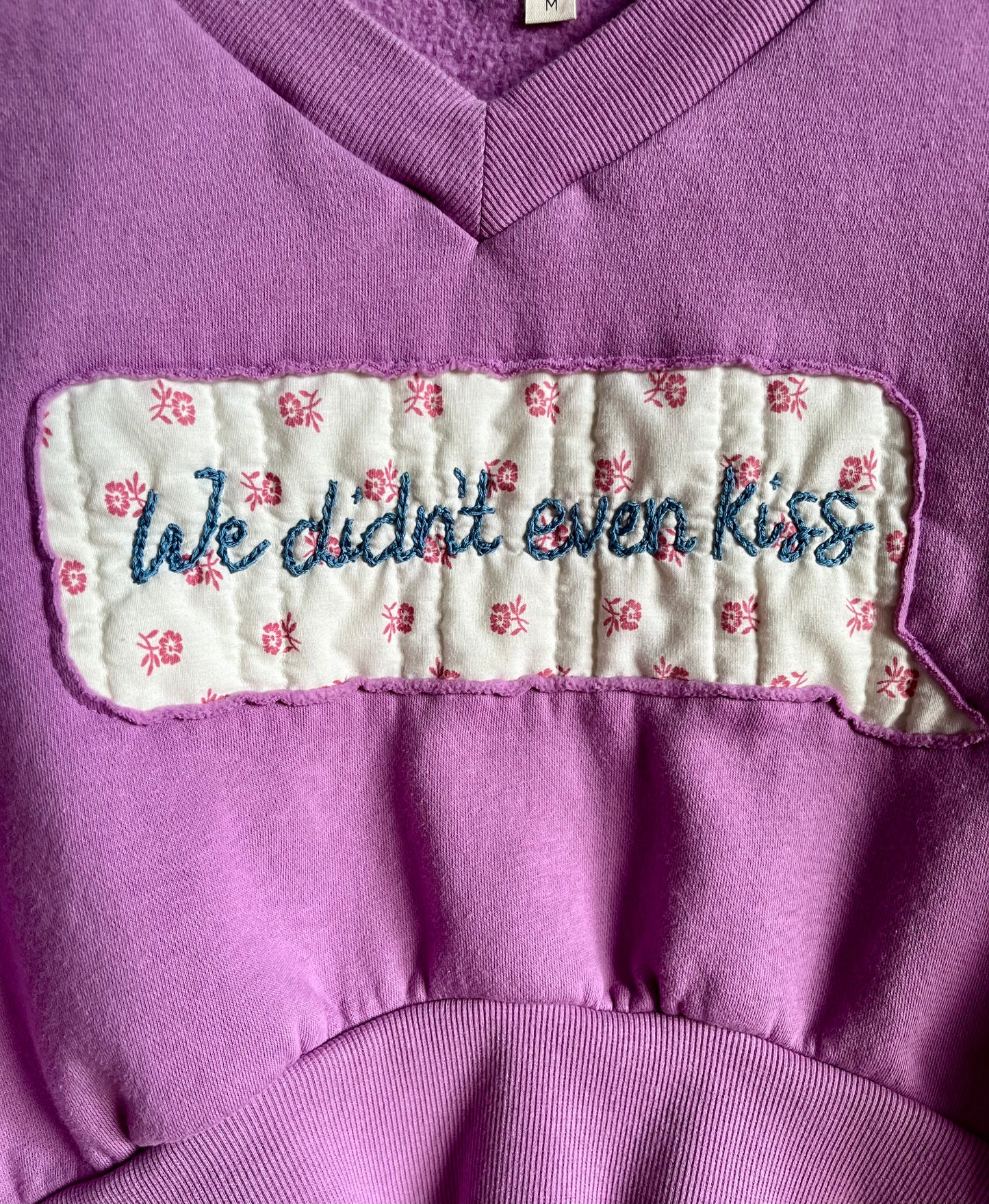 “We Didn’t Even Kiss” Embroidered Cropped V-Neck - Medium